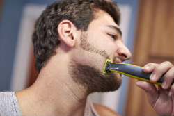 Philips Norelco OneBlade hybrid electric trimmer and shaver Shave It Off